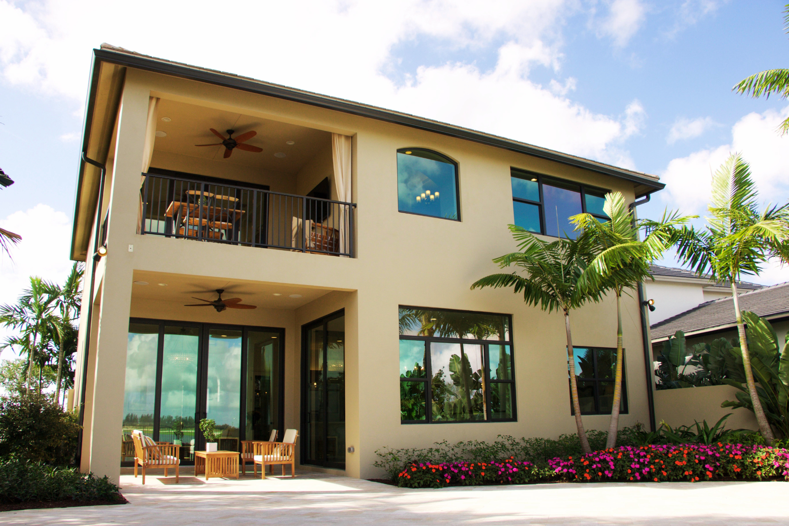 Palmetto Bay home rear patio with impact windows and doors on both floors